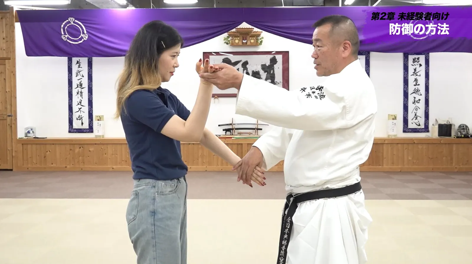 腹部に対して下からの攻撃に対しての防御方法とその実演